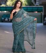 Olive whisper - green dabu kota doria saree with unstitched blouse