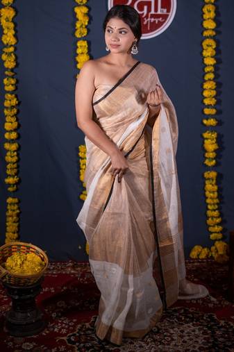 green striped linen saree with unstitched blouse