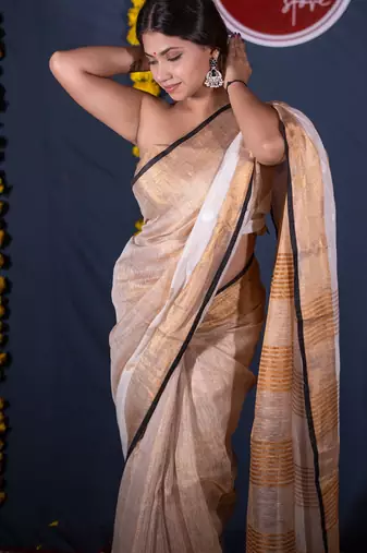 green striped linen saree with unstitched blouse
