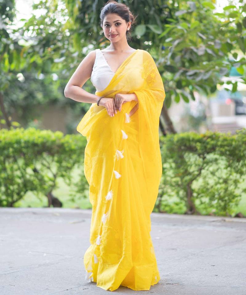 yellow embroidered kota doria saree