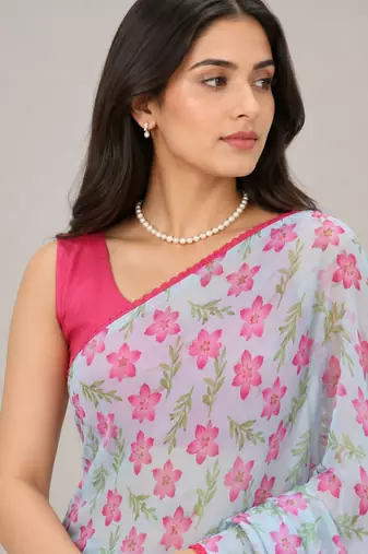 Sky Blue color all over floral printed with premium lace border gorgette saree with unstitched blouse