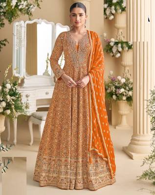 Orange georgette full stitched free size upto 42 heavy embroidery wedding gowns 1