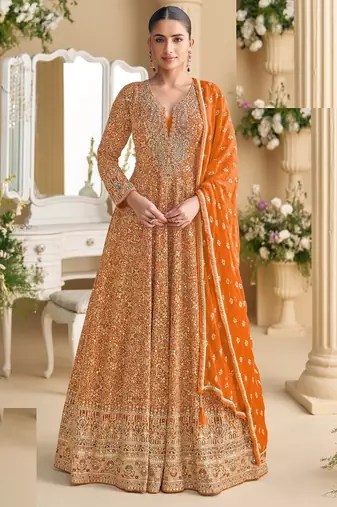 Orange georgette full stitched free size upto 42 heavy embroidery wedding gowns
