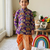 Kids festive purple elephant motif kurta and orange dhoti set