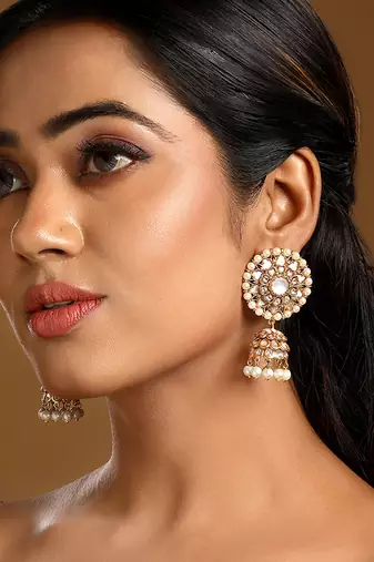 Gold plated kundan floral stud jhumkas