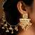 Gold plated kundan polki earrings with earchains