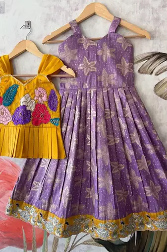 Festivewear lavender viscose tissue embroidered lace gown with maggam work koti