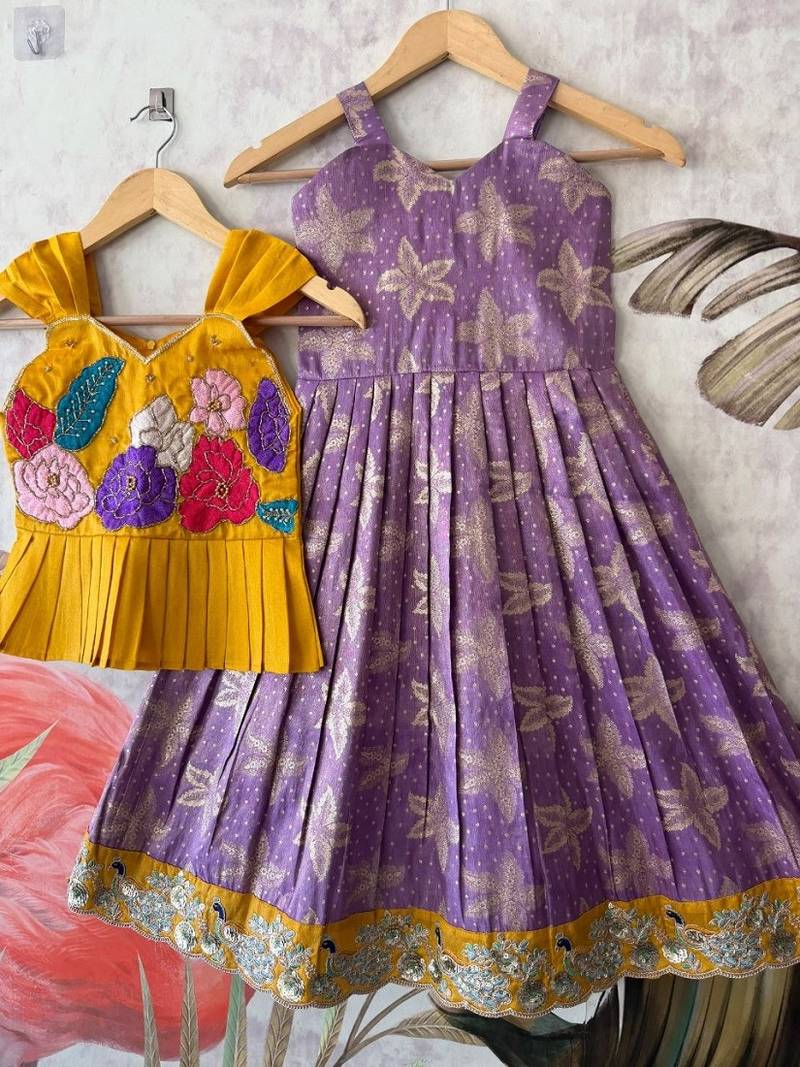 Festivewear lavender viscose tissue embroidered lace gown with maggam work koti