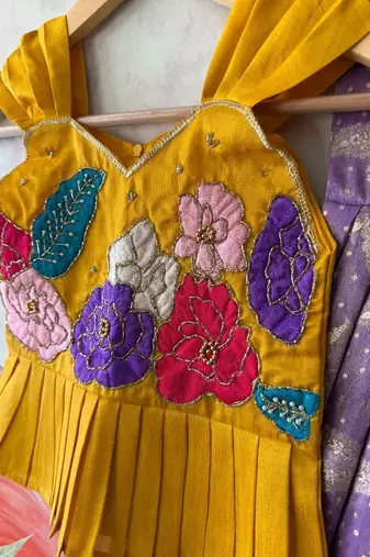 Festivewear lavender viscose tissue embroidered lace gown with maggam work koti
