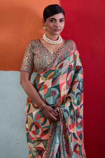 Green cotton crepe geometrical printed saree