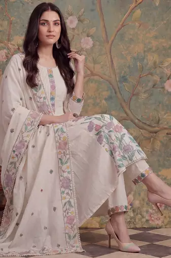 white cotton embroidered have a linin kurta pant dupatta set