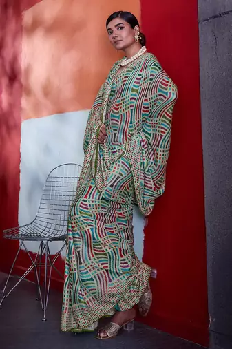 Teal green cotton crepe geometrical printed saree