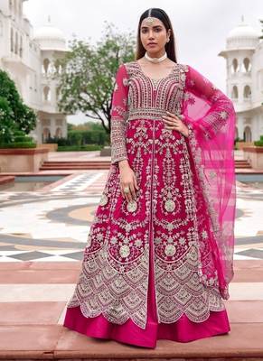 Rani pink butterfly net heavy embroidered semi-stitched suit set with dupatta 1