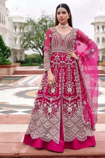 Rani pink butterfly net heavy embroidered semi-stitched suit set with dupatta