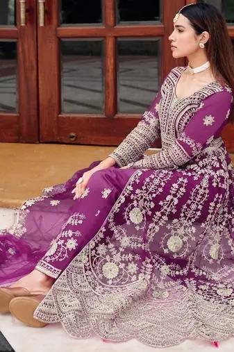 Purple butterfly net heavy embroidered semi-stitched suit set with dupatta