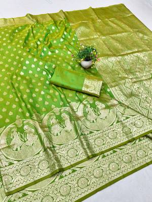 Green zari woven silk blend traditional saree with blouse piece 1