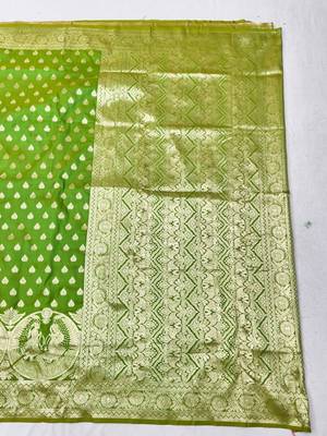 Green zari woven silk blend traditional saree with blouse piece 2