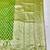Green zari woven silk blend traditional saree with blouse piece