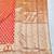 Orange zari woven banarasi silk blend traditional saree with blouse piece