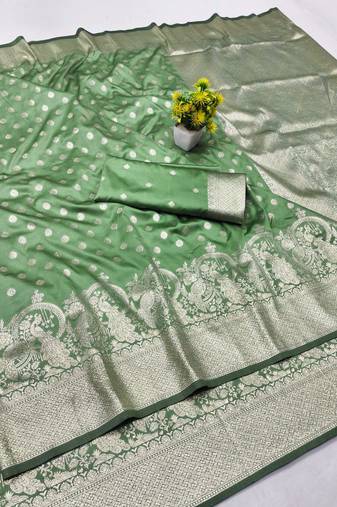 Light green zari woven banarasi silk blend traditional saree with blouse piece