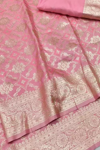 Pink zari woven silk blend traditional saree with blouse piece