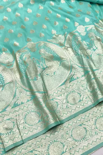 Blue zari woven silk blend traditional saree with blouse piece