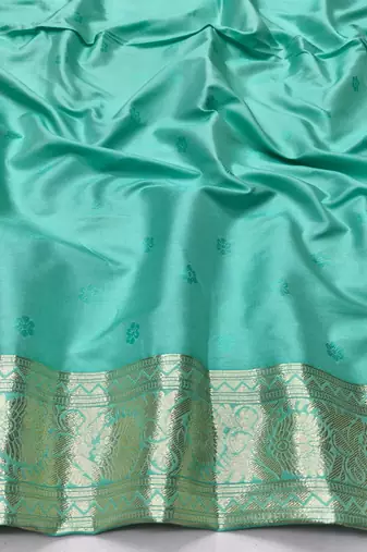 Blue zari woven silk blend traditional saree with blouse piece