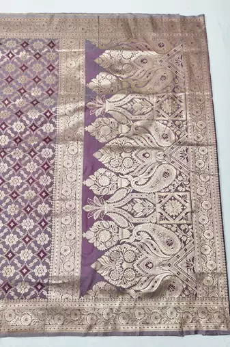 Purple zari woven silk blend traditional saree with blouse piece