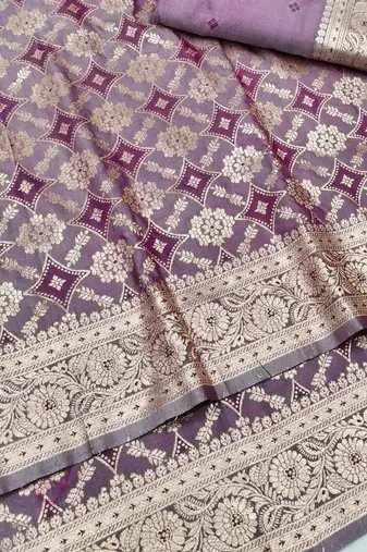 Purple zari woven silk blend traditional saree with blouse piece
