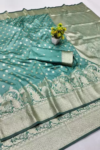 Green zari woven banarasi silk blend traditional saree with blouse piece