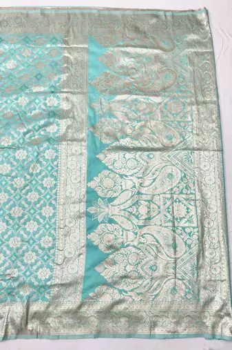 Blue zari woven silk blend traditional saree with blouse piece