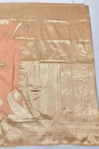 Light orange zari woven silk blend traditional saree with blouse piece