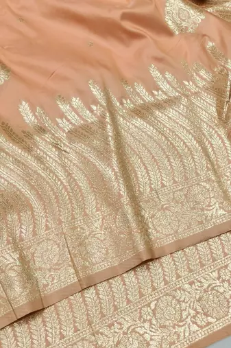 Light orange zari woven silk blend traditional saree with blouse piece