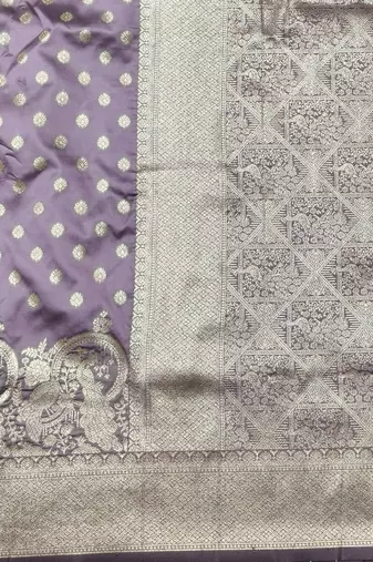 Purple zari woven silk blend traditional saree with blouse piece