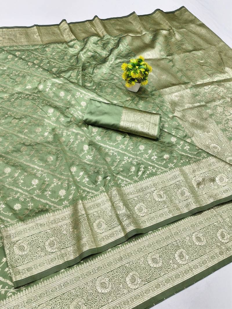 Pista zari woven banarasi silk blend traditional saree with blouse piece