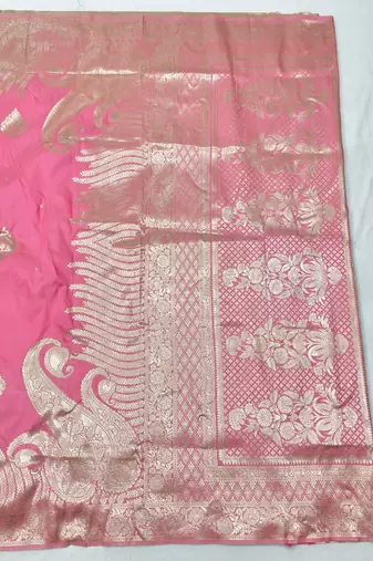 Pink zari woven silk blend traditional saree with blouse piece