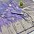 Purple zari woven banarasi silk blend traditional saree with blouse piece