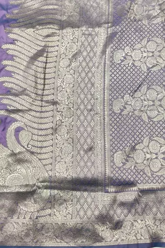Purple zari woven silk blend traditional saree with blouse piece