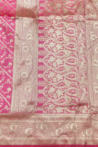 Pink zari woven silk blend traditional saree with blouse piece