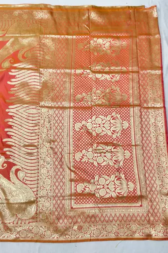 Orange zari woven silk blend traditional saree with blouse piece