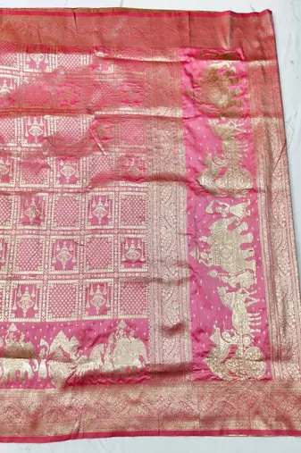 Pink zari woven silk blend traditional saree with blouse piece