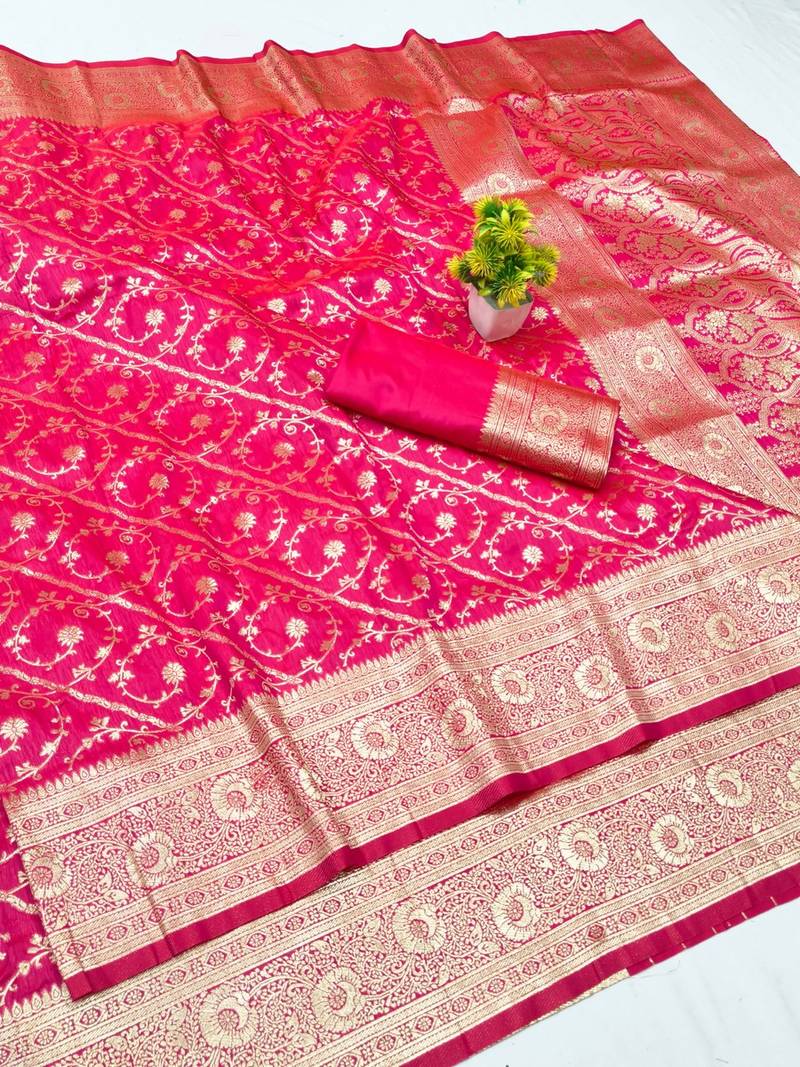 Rani pink zari woven banarasi silk blend traditional saree with blouse piece