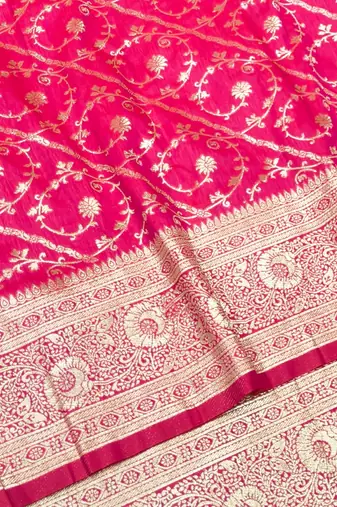 Rani pink zari woven silk blend traditional saree with blouse piece