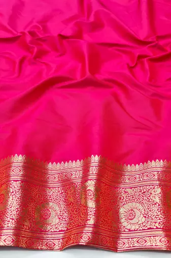 Rani pink zari woven silk blend traditional saree with blouse piece