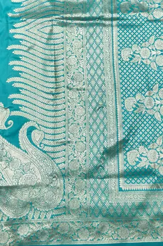 Blue zari woven silk blend traditional saree with blouse piece