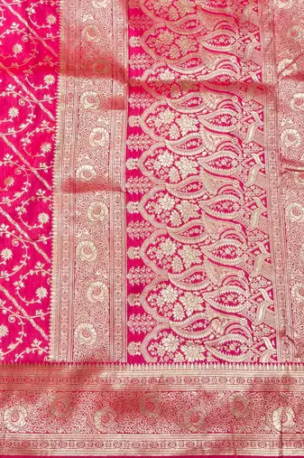 Rani pink zari woven silk blend traditional saree with blouse piece