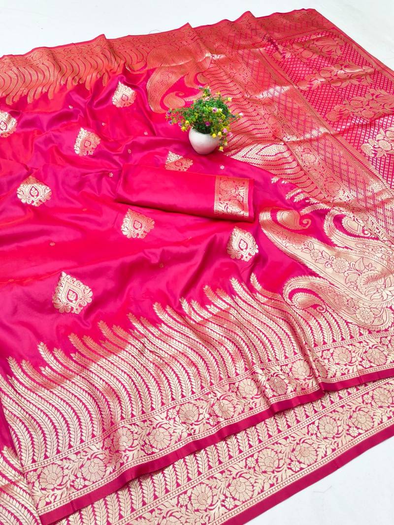 Rani pink zari woven banarasi silk blend traditional saree with blouse piece