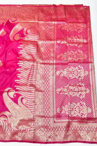 Rani pink zari woven silk blend traditional saree with blouse piece