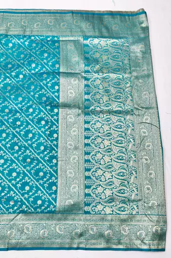 Blue zari woven silk blend traditional saree with blouse piece
