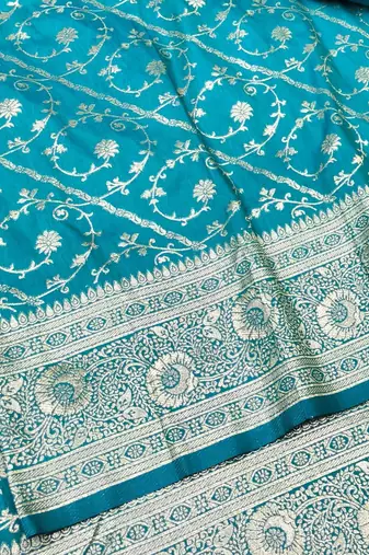 Blue zari woven silk blend traditional saree with blouse piece